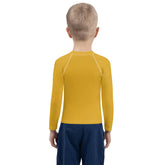 Child wearing Cinderella magic coach rash guard