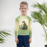 Child wearing CB6-27 rash guard swimming confidently