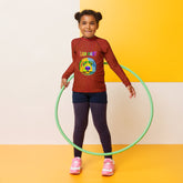 Magic Carpet Ride Kids Rash Guard front view with vibrant design