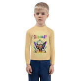 Child wearing Mermaid Lagoon rash guard at the beach