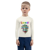 Child wearing Wizard's Castle rash guard in pool