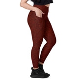 Woman showcasing Verdant Vines Leaf Texture Leggings with pockets amidst nature, blending style and utility.