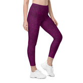 Woman exploring a dewy meadow in leaf texture leggings, featuring stylish and practical pockets.