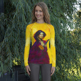 Trendy SurArt 75 Women's Rash Guard on a surfer girl riding waves