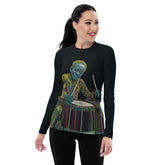 Woman wearing Sonic Pulse rash guard while snorkeling.