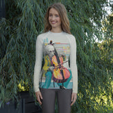 Beat Flow women's rash guard in action while surfing.