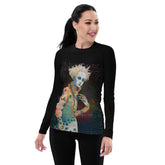 Woman wearing Harmony Melodies rash guard while surfing.