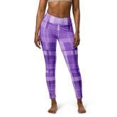 Practicing an advanced yoga pose in Indigo Stride Yoga Leggings.