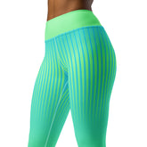 Serene Sunset Gradient Yoga Leggings on model demonstrating yoga pose