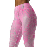 Tabloid Treasures Yoga Leggings worn during a serene yoga pose.