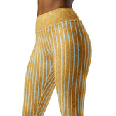 Practicing yoga in Rebel Rebel Yoga Leggings, showcasing bold designs for the daring yogi.