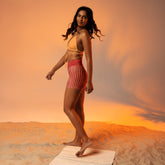 Practicing yoga in Blue Jean Fusion Yoga Shorts, combining classic denim style with flexible comfort.