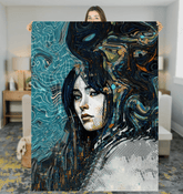 Artistic Aura Sherpa Blanket displayed on a cozy living room sofa.