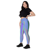 Artistic crossover leggings with pockets showcasing vibrant line design.