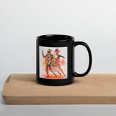Balletic Dreamland black glossy mug on a white background.