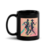 Elegant black glossy mug with balletic flourishes design.