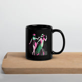 Balletic Perfection black glossy mug on a marble countertop.
