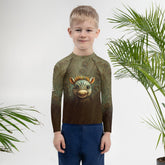 Child wearing CB3-30 Kids Rash Guard swimming confidently in the pool.