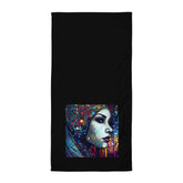 Doodle Daze III colorful beach towel spread out on the sand.