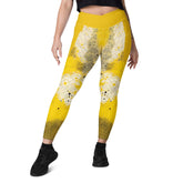 Woman wearing Dynamic crossover leggings with pockets in dance studio.