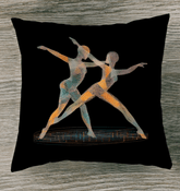 Enchanting Dance of Women decorative indoor pillow on a sofa.