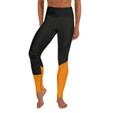 Woman practicing yoga in expressive feminine leggings.