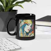 Graphic Greatness II black glossy mug on a wooden table.