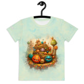 "Child wearing Magical Confectionary Smiles T-shirt with colorful candy prints.
