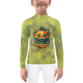Child wearing Magical Merry Go Round Rash Guard at the beach.