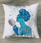 Tranquility Terrace outdoor pillow on a sunlit patio chair.