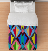 Whispering Vines Art Nouveau Comforter - Twin on a neatly made twin bed.