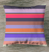 Retro Rainbow Blast Stripe Outdoor Pillow on a garden bench.