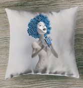 Colorful tribal tapestry design on an outdoor pillow for patio decoration.