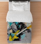 Neutral Geometry Comforter on a neatly made bed.