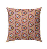 Oceanic Bliss patterned outdoor pillow on garden bench