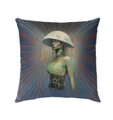 Mystic Garden Beyond Style Outdoor Pillow on a beautifully landscaped patio.