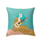 Tranquil Terrace decorative indoor pillow on a cozy sofa.