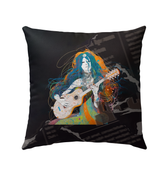 Vibrant Blossom Bliss pillow on an outdoor garden bench.