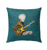 Zinnia Zen Outdoor Pillow on a garden bench, showcasing vibrant colors and patterns.