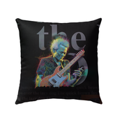 Vibrant Orchid Odyssey pillow on an outdoor garden chair, enhancing patio aesthetics.