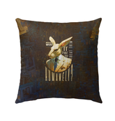 Artistic rabbit painting on outdoor pillow in a garden setting.