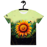 Child wearing Radiant Gaze of Nature crew neck T-shirt in a garden setting.