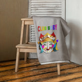 Fairy Garden Bliss Premium Bath Towel displayed on a bathroom rack.