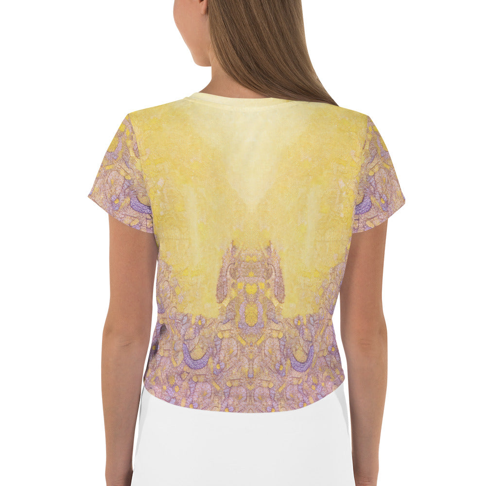 Stylish women's unicorn crop tee side view.