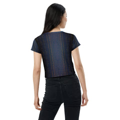 Woman wearing Geometric Grace Crop T-Shirt with high-waisted jeans.