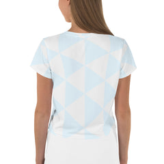 Side view of women's crop tee in breathable fabric.