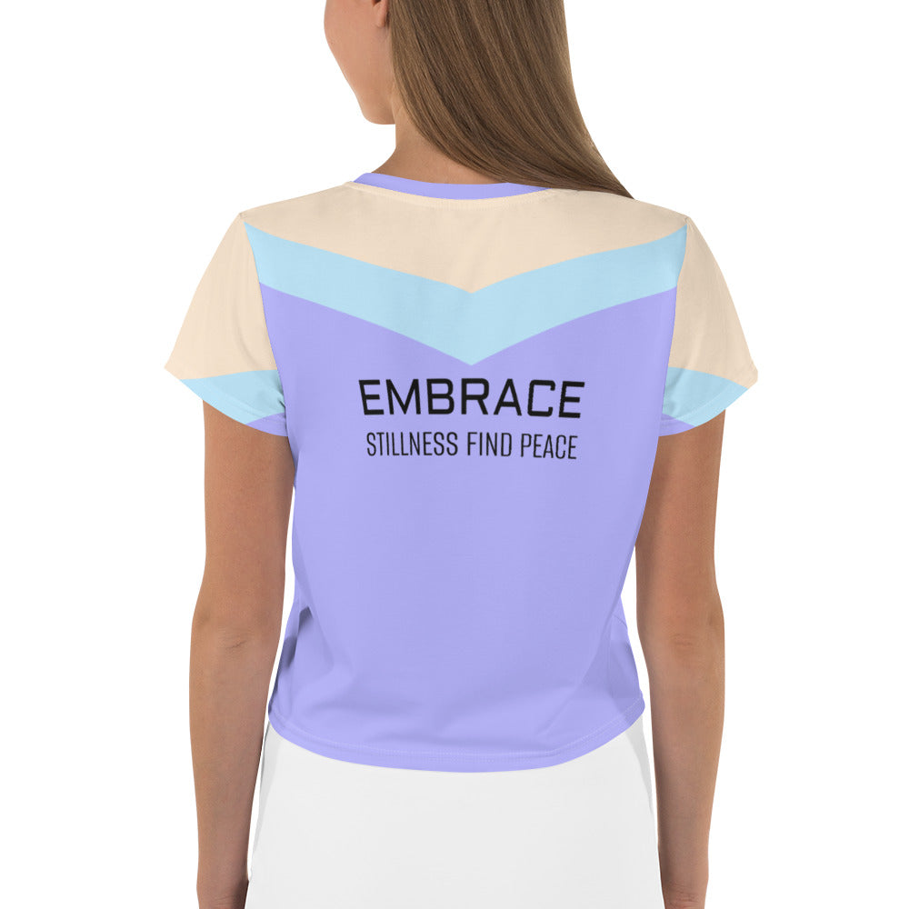 Back view of Sunrise Stretch Women's Crop Tee in casual outfit.