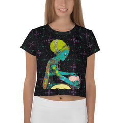 Wildflower Wanderlust Women's Crop T-Shirt on a clothing rack.