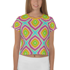 Woman wearing vibrant abstract art crop tee.