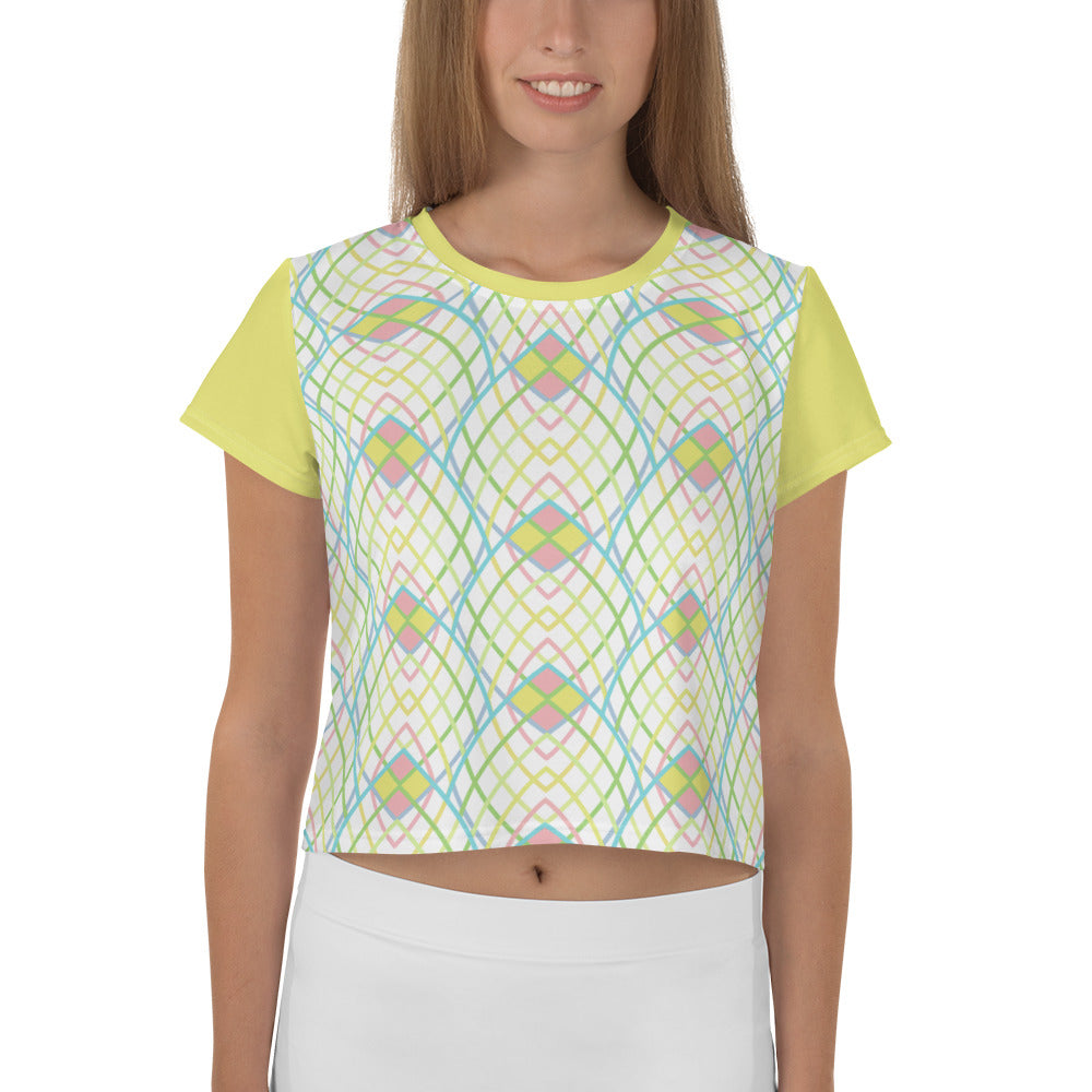 Woman wearing Geometric Allure Crop T-Shirt in urban setting.